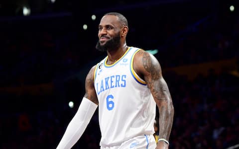 LOS ANGELES, CA - FEBRUARY 23: LeBron James #6 of the Los Angeles Lakers looks on during the game against the Golden State Warriors on February 23, 2023 at Crypto.Com Arena in Los Angeles, California. NOTE TO USER: User expressly acknowledges and agrees that, by downloading and/or using this Photograph, user is consenting to the terms and conditions of the Getty Images License Agreement. Mandatory Copyright Notice: Copyright 2023 NBAE (Photo by Adam Pantozzi/NBAE via Getty Images) 
