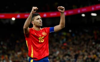 epa11245640 Spain's Rodri Hernandez celebrates after scoring the 1-0 goal during the international friendly soccer match between Spain and Brazil, in Madrid, Spain, 26 March 2024.  EPA/Mariscal