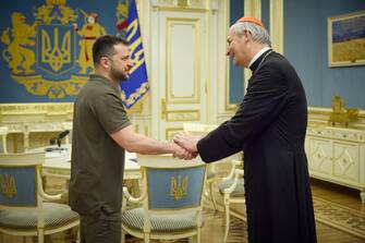 epa10676086 A handout photo made available by the Office of the President of Ukraine shows Ukrainian President Volodymyr Zelensky (L) meeting with Cardinal Matteo Zuppi, Special Envoy of Pope Francis, in Kyiv, Ukraine, 06 June 2023, amid Russia's invasion.  EPA/Ukraine President's Office HANDOUT  HANDOUT EDITORIAL USE ONLY/NO SALES