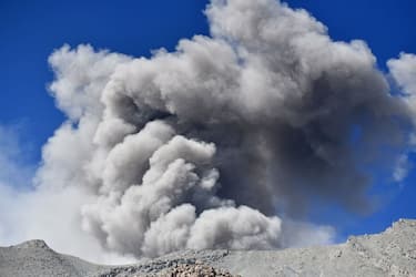A plume of smoke and ash rises from the crater of the Ubinas volcano, located in the Moquegua region of southern Peru, on July 5, 2023. Peru's Ubinas volcano, active again after four dormant years, blew its top twice on July 4, showering nearby towns with ash, the country's IGP geophysical institute said. (Photo by Diego Ramos / AFP) (Photo by DIEGO RAMOS/AFP via Getty Images)