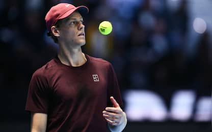 Italy's Jannik Sinner plays with the ball during the men's single final match against Spain's Carlos Alcaraz at the ATP Finals tennis tournament, in Turin, on November 16, 2025. (Photo by Marco BERTORELLO / AFP)
