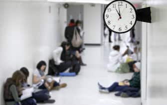 Students waiting in corridor. Please Also See: