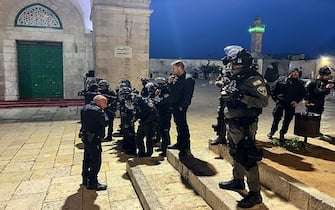 Israeli security forces stand guard at the Al-Aqsa Mosque compound in Jerusalem on April 5, 2023. - Clashes erupted inside the Al-Aqsa mosque in Jerusalem early April 5, 2023 as Israeli police said they had entered to dislodge "agitators", a move denounced as an "unprecedented crime" by the Palestinian Islamist movement Hamas.
Hamas, which rules the Gaza Strip, called on Palestinians in the West Bank "to go en masse to the Al-Aqsa mosque to defend it". (Photo by AHMAD GHARABLI / AFP) (Photo by AHMAD GHARABLI/AFP via Getty Images)
