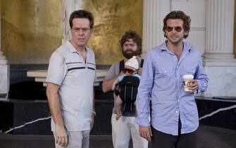 Bradley Cooper (L-r) Stu (ED HELMS), Alan (ZACH GALIFIANAKIS), Baby Tyler, and Phil (BRADLEY COOPER) wait for their car at the valet in Warner Bros. Pictures' and Legendary Pictures' comedy "The Hangover," a Warner Bros. Pictures release.
PHOTOGRAPHS TO BE USED SOLELY FOR ADVERTISING, PROMOTIONAL, PUBLICITY OR REVIEWS OF THIS SPECIFIC MOTION PICTURE AND TO REMAIN THE PROPERTY OF THE STUDIO. NOT FOR SALE OR REDISTRIBUTION.