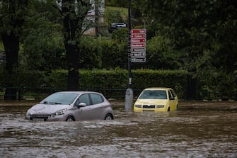 epa11605643 A view of a damaged cars caused by the overflowing of the Bela River following heavy rain in the town of Jesenik, Czech Republic, 15 September 2024. Floods caused by heavy rains have been battering central and eastern Europe since 13 September, with at least four dead in Romania, four missing in the Czech Republic, and alarming water levels recorded in Poland.  EPA/MARTIN DIVISEK