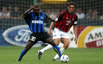 ©LORENZO COPPI/LAPRESSE
13-05-03 MILANO
SPORT CALCIO
SEMIFINALE CHAMPIONS LEAGUE 2002-2003 INTER - MILAN
NELLA FOTO:MARTINS OBAFEMI E PAOLO MALDINI