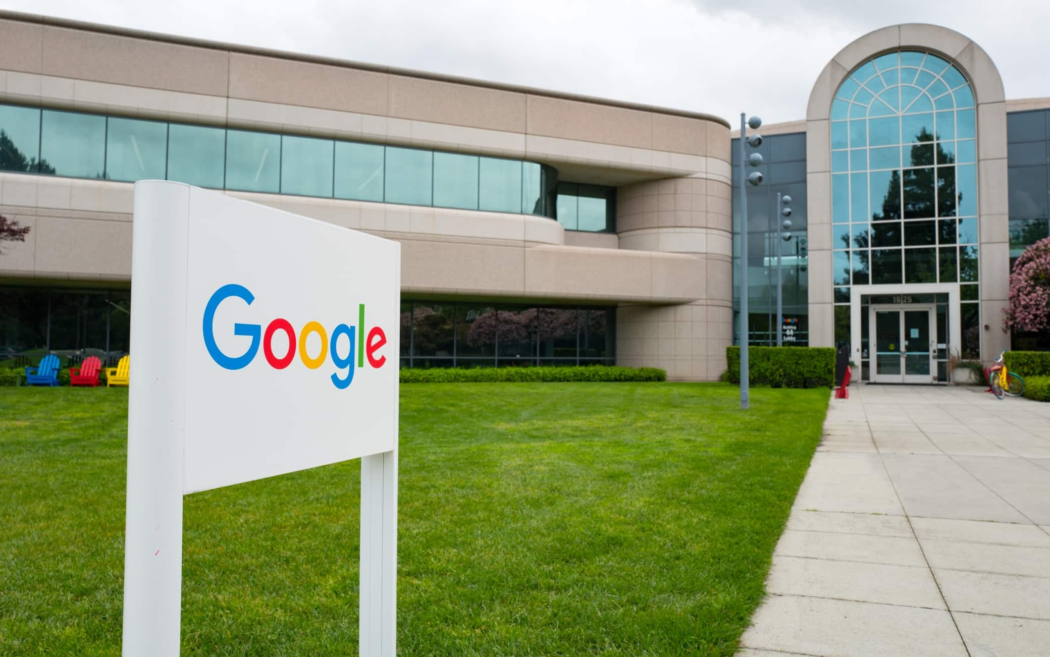 Logo with signage in front of Building 44, which houses employees working on the Android mobile phone operating system, at the Googleplex, headquarters of Google Inc in the Silicon Valley town of Mountain View, California, April 7, 2017. (Photo via Smith Collection/Gado/Getty Images).