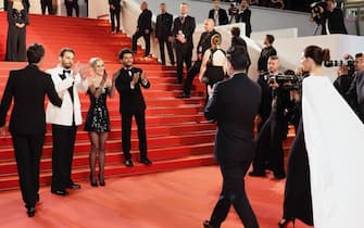 CANNES, FRANCE - MAY 22: (L-R) Sam Levinson, Lily-Rose Depp and Abel “The Weeknd” Tesfaye attend the "The Idol" red carpet during the 76th annual Cannes film festival at Palais des Festivals on May 22, 2023 in Cannes, France. (Photo by Mike Coppola/Getty Images)