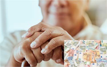 anziano col bastone e banconote di euro
