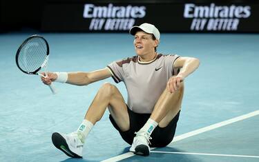 MELBOURNE, AUSTRALIA - JANUARY 28: Jannik Sinner of Italy celebrates winning championship point in their Men's Singles Final match against Daniil Medvedev during the 2024 Australian Open at Melbourne Park on January 28, 2024 in Melbourne, Australia. (Photo by Daniel Pockett/Getty Images)