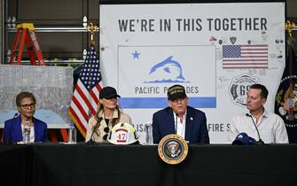 Los Angeles Mayor Karen Bass (L), US First Lady Melania Trump look on as US President Donald Trump speaks during a fire emergency briefing at Station 69 in Pacific Palisades, a neighborhood of Los Angeles, California, on January 24, 2025. (Photo by Mandel NGAN / AFP)