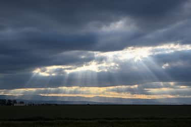 BAKERSFIELD, CA - APRIL 2: A view of sun lights glitter through huge clouds in Kern County of California, United States on April 2, 2023. (Photo by Tayfun Coskun/Anadolu Agency via Getty Images)