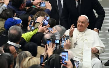 Pope Francis greets faithful during his weekly general audience in Paolo VI Hall at the Vatican, 10 January  2024.  ANSA/MAURIZIO BRAMBATTI