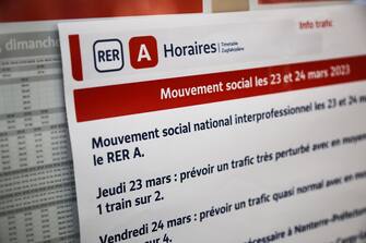 epa10538070 A sign informs about transport disruption inside La Defense station during a day of national strike led by French trade unions against the government's reform to the pension system, in Puteaux, Paris, France, 23 March 2023. Metro traffic was slightly disrupted with some lines running at half capacity. Protests continue in France after the prime minister announced on 16 March 2023 the use of Article 49 paragraph 3 (49.3) of the French Constitution to have the text on the controversial pension reform law - raising retirement age from 62 to 64 - be definitively adopted without a vote.  EPA/CHRISTOPHE PETIT TESSON