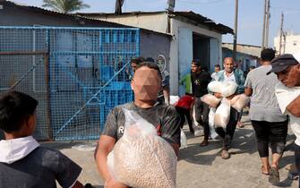 assalto ai magazzini di cibo nella Striscia di Gaza