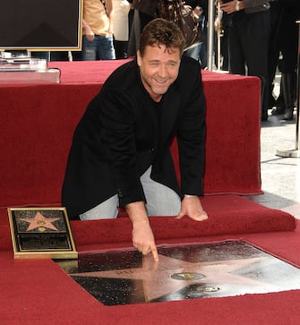 HOLLYWOOD - APRIL 12:  Actor Russell Crowe receives a star on the Hollywood Walk Of Fame on April 12, 2010 in Hollywood, California.  (Photo by Jason LaVeris/FilmMagic)