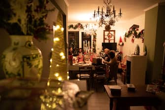 Italian family enjoying Christmas Eve dinner at home