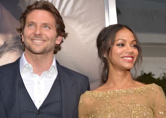 HOLLYWOOD, CA - SEPTEMBER 04:  Actors Bradley Cooper (L) and Zoe Saldana arrive at the Los Angeles premiere of "The Words" at ArcLight Cinemas on September 4, 2012 in Hollywood, California.  (Photo by Lester Cohen/WireImage)