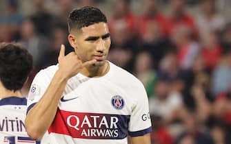 epa10908431 Paris Saint Germain's Acharaf Hakimi celebrates after scoring a goal during the French Ligue 1 soccer match between Stade Rennais and PSG at the Roazhon Park stadium in Rennes, France, 08 October 2023.  EPA/TERESA SUAREZ