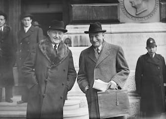 Konrad Adenauer (1876 - 1967, left), the German Chancellor, and Robert Schuman (1886 - 1963, right), the French Foreign Minister, leave the Foreign Office in London after attending the European Army Conference, 18th February 1952.  (Photo by Ron Burton/Keystone/Hulton Archive/Getty Images)