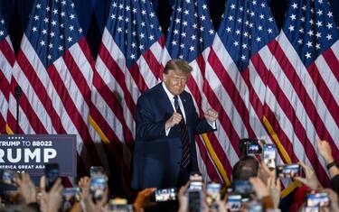 Former US President Donald Trump dances during a New Hampshire primary election night watch party in Nashua, New Hampshire, US, on Tuesday, Jan. 23, 2024. Trump won the New Hampshire primary, dealing a blow to his only remaining major rival Nikki Haley and solidifying his status as the Republican party's likely nominee. Photographer: Al Drago/Bloomberg via Getty Images