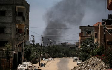 epa11397451 Smoke rises following an air strike during the Israeli military operation in Al Nusairat refugee camp in the central Gaza Strip 08 June 2024. More than 36,000 Palestinians and over 1,400 Israelis have been killed, according to the Palestinian Health Ministry and the Israel Defense Forces (IDF), since Hamas militants launched an attack against Israel from the Gaza Strip on 07 October 2023, and the Israeli operations in Gaza and the West Bank which followed it.  EPA/MOHAMMED SABER