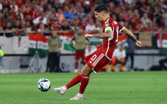 epa10702571 Dominik Szoboszlai of Hungary in action during the UEFA Euro 2024 qualification soccer match between Hungary and Lithuania at Puskas Arena in Budapest, Hungary, 20 June 2023.  EPA/Robert Hegedus HUNGARY OUT