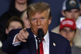 MANCHESTER, NEW HAMPSHIRE - JANUARY 20: Republican presidential candidate and former President Donald Trump speaks during a campaign rally at the SNHU Arena on January 20, 2024 in Manchester, New Hampshire. Trump is rallying four days before New Hampshire voters will weigh in on the Republican nominating race with their first-in-the-nation primary.  (Photo by Alex Wong/Getty Images)