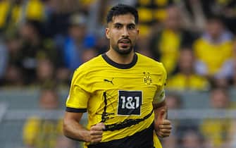 epa10905794 Dortmund's Emre Can in action during the German Bundesliga soccer match between Borussia Dortmund and 1.FC Union Berlin in Dortmund, Germany, 07 October 2023.  EPA/CHRISTOPHER NEUNDORF CONDITIONS - ATTENTION: The DFL regulations prohibit any use of photographs as image sequences and/or quasi-video.