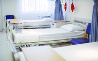 Empty beds in hospital room