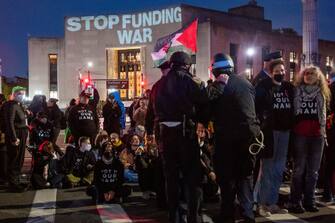 NEW YORK, NEW YORK - APRIL 23: Jews and supporters participate in civil disobedience during a Passover Seder to protest the war in Gaza on April 23, 2024 in the in Brooklyn borough of New York City. The event, which resulted in dozens of arrests, was held blocks from the residence of U.S. Sen. Chuck Schumer (D-NY). Schumer is a longtime supporter of Israel, but has recently criticized President Benjamin Netanyahu for Isreal's conduct of the war. (Photo by Spencer Platt/Getty Images)