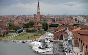 Panoramica della flotta Ferretti Yachts, ormeggiata nella darsena Grande all'Arsenale di Venezia, in occasione dei festeggiamenti del cinquantenario della fondazione della Ferretti Yachts,  22 giugno 2018.    ANSA/ANDREA MEROLA