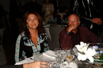 ROMA - OTTOBRE 2002 GALLERIA D'ARTE MODERNA - MOSTRA DEL FOTOGRAFO FRANCESCO ESCALAR - GINO PAOLI CON LA MOGLIE PAOLA PENZO © MAURO CRINELLA