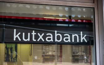 Barcelona, Spain - October 3, 2022: Facade and logo of the Kutxabank bank office in Barcelona, Catalonia, Spain
