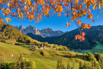 BOLZANO, SOUTH TYROL, ITALY - 2021/10/23: (EDITORS NOTE: Exposure latitude of this image has been digitally increased.) 
View of the Church of St. Magdalena in VillnÃ¶ss valley, north faces and summits of Odle group in the distance, in autumn. (Photo by Frank Bienewald/LightRocket via Getty Images)