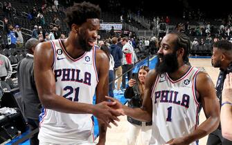 MILWAUKEE, WI - MARCH 4: Joel Embiid #21 high fives James Harden #1 of the Philadelphia 76ers after the game against the Milwaukee Bucks on March 4, 2023 at the Fiserv Forum Center in Milwaukee, Wisconsin. NOTE TO USER: User expressly acknowledges and agrees that, by downloading and or using this Photograph, user is consenting to the terms and conditions of the Getty Images License Agreement. Mandatory Copyright Notice: Copyright 2023 NBAE (Photo by Gary Dineen/NBAE via Getty Images).
