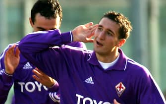 20050213-FIRENZE-SPR-CALCIO: CAMPIONATO SERIE A: FIORENTINA-PARMA. L' esultanza di Chiellini dopo il primo gol per la Fiorentina. MARCO BUCCO/ANSA