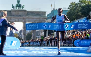 24 September 2023, Berlin: Athletics: Berlin Marathon. Tigst Assefa from Ethiopia is the first woman to cross the finish line at the BMW Berlin Marathon after 2:11:53 hours and thus achieves a world record. Photo: Andreas Gora/dpa (Photo by Andreas Gora/picture alliance via Getty Images)