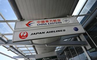 China Easter Airlines and Japan Airlines terminal signs at John F. Kennedy (JFK) International Airport in the Queens borough of New York City, NY, April 14, 2021. As of Sunday April 18 New York State Department of Health will no longer require travelers to fill out a health form as it lifts the COVID-19 quarantine and testing requirements for international travelers arriving into the state. (Photo by Anthony Behar/Sipa USA)