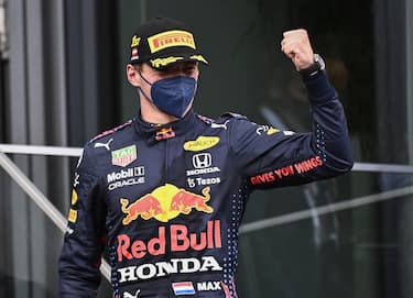 epa09305463 Dutch Formula One driver Max Verstappen of Red Bull Racing celebrates on the podium after winning the Formula One Grand Prix of Styria at the Red Bull Ring in Spielberg, Austria, 27 June 2021.  EPA/CHRISTIAN BRUNA