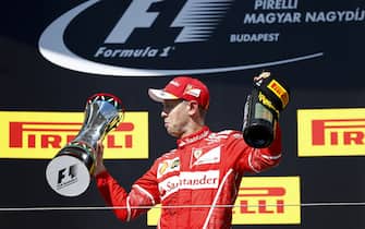 Hungaroring, Budapest, Hungary. 
Sunday 30 July 2017.
Sebastian Vettel, Ferrari, 1st Position, with his trophy.
World Copyright: Glenn Dunbar/LAT Images 
ref: Digital Image _X4I2905