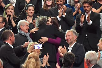 LYON, FRANCE - OCTOBER 21: Tim Burton and Monica Bellucci attends the Lumiere  Award ceremony during the 14th Film Festival Lumiere on October 21, 2022 in Lyon, France. (Photo by Dominique Charriau/WireImage)