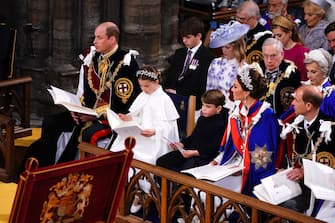 LONDON, ENGLAND - MAY 06: (left to right 1st row) Prince William, Prince of Wales, Princess Charlotte, Prince Louis, Catherine, Princess of Wales and the Duke of Edinburgh at the Coronation of King Charles III and Queen Camilla on May 6, 2023 in London, England. The Coronation of Charles III and his wife, Camilla, as King and Queen of the United Kingdom of Great Britain and Northern Ireland, and the other Commonwealth realms takes place at Westminster Abbey today. Charles acceded to the throne on 8 September 2022, upon the death of his mother, Elizabeth II. (Photo by Yui Mok - WPA Pool/Getty Images)