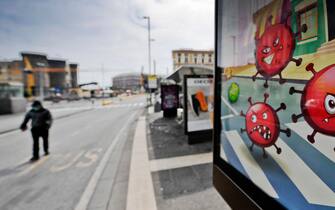 A banner in Naples, Italy, advertises a sanitizing company. In the graphics are visible, in a stylized form, the Covid 19 viruses as they appear under the microscope, 17 march 2020
ANSA / CIRO FUSCO