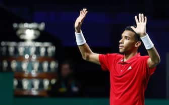 Felix Auger-Aliassime of Canada celebrates the victory against Lorenzo Musetti of Italy during the second tennis match from Davis Cup Finals 2022, Semi-Finals round, played between Italy and Canada on november 26, 2022 at Palacio de Deportes Martin Carpena pavilion in Malaga, Spain - Photo: Oscar J Barroso/DPPI/LiveMedia
