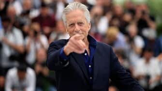 US actor and Honorary Palme d'or laureate Michael Douglas gestures during a photocall at the 76th edition of the Cannes Film Festival in Cannes, southern France, on May 16, 2023. (Photo by Valery HACHE / AFP) (Photo by VALERY HACHE/AFP via Getty Images)
