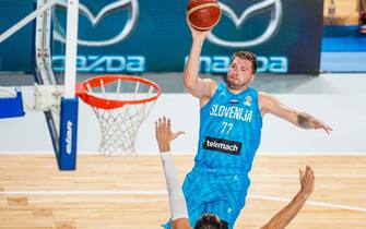 CELJE, SLOVENIA - AUGUST 20: Luka Doncic of Slovenia shoots the ball during the basketball friendly match between Slovenia and Croatia in Dvorak Zlatorog hall on August 20, 2022 in Celje, Slovenia. (Photo by Jurij Kodrun/Getty Images)