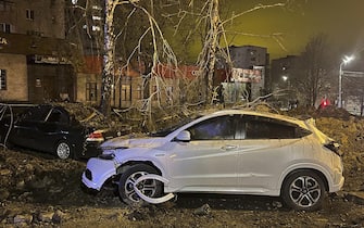 epa10583548 A handout photo made available by the Governor of the Belgorod Region Vyacheslav Gladkovâ€™s telegram channel shows damaged cars near the blast crater in downtown Belgorod, Russia, 20 April 2023, (issued 21 April 2023) The Russian Ministry of Defense reported that on the evening of 20 April, a Su-34 bomber over Belgorod experienced an abnormal munition drop, and an investigation was underway. According to preliminary data, two people were injured in the blast.  EPA/BELGOROD GOVERNOR VYACHESLAV GLADCOV TELEGRAM CHANNEL/HANDOUT  HANDOUT EDITORIAL USE ONLY/NO SALES