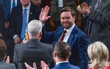 epa11810225 US Vice President-elect JD Vance waves following the electoral vote certification in President-elect Trump's election victory, which took place on the House floor of the US Capitol in Washington, DC, USA, 06 January 2025. The certification comes exactly four years after a mob of Trump-supporting insurrectionists stormed the Capitol, attempting to disrupt the certification of US President Joe Biden.  EPA/SHAWN THEW