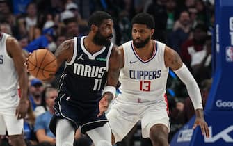 DALLAS, TX - APRIL 28: Kyrie Irving #11 of the Dallas Mavericks handles the ball during the game against the LA Clippers during Round 1 Game 4 of the 2024NBA Playoffs on April 28, 2024 at the American Airlines Center in Dallas, Texas. NOTE TO USER: User expressly acknowledges and agrees that, by downloading and or using this photograph, User is consenting to the terms and conditions of the Getty Images License Agreement. Mandatory Copyright Notice: Copyright 2024 NBAE (Photo by Glenn James/NBAE via Getty Images)